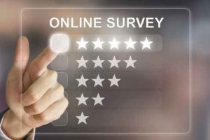 business hand pushing online survey on virtual screen